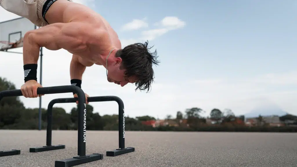 Deep Handstand Pushup on Metal parallettes by GORNATION